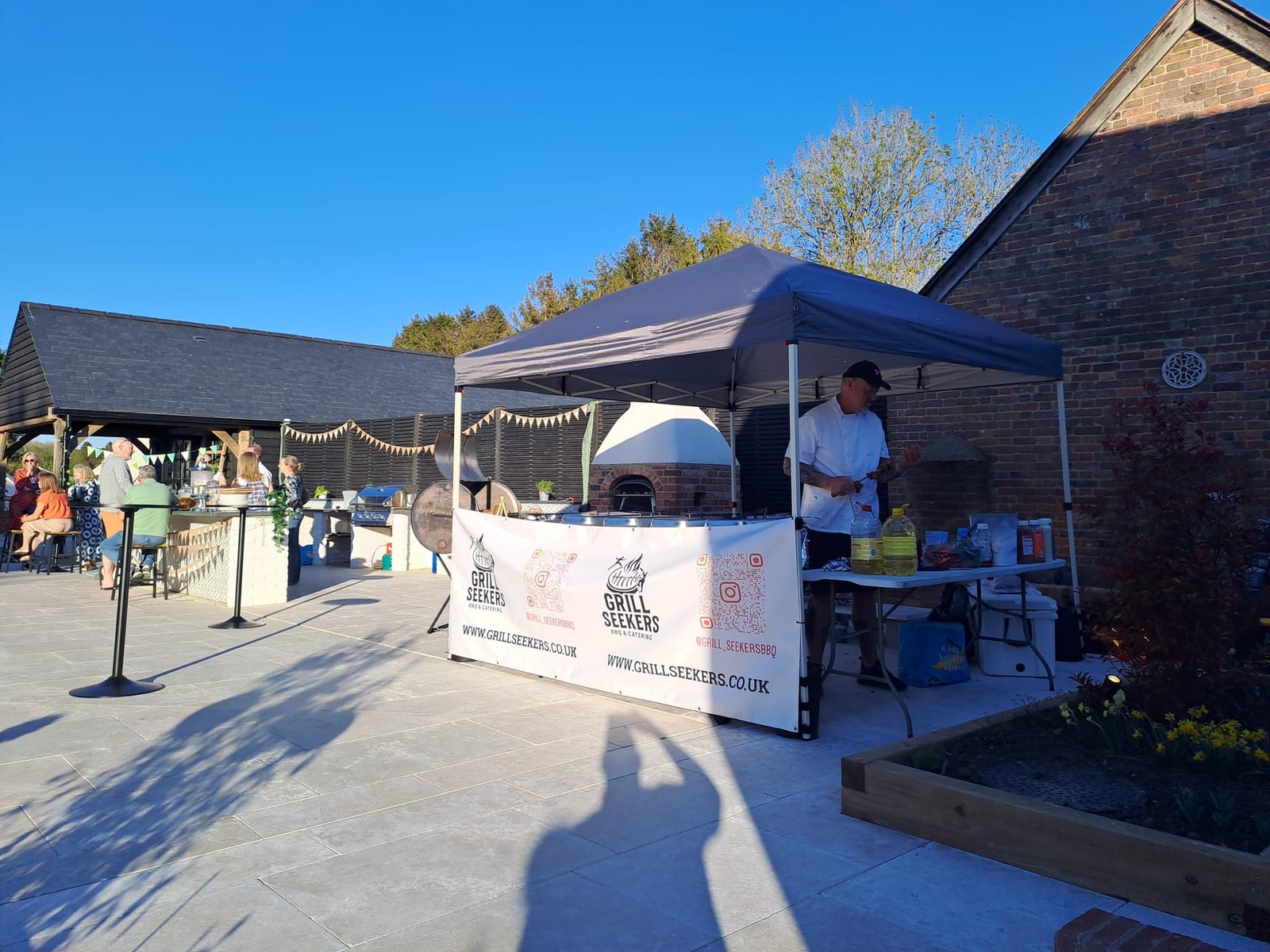 Grill Seekers outdoor kitchen and gazebo set up for a large event